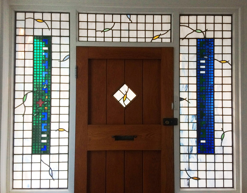 Contemporary door set commission featuring panels by stained glass artist Brian Clarke as per client brief.